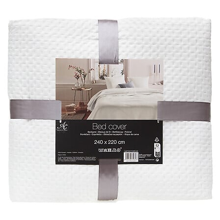 Dessus de lit matelassé dans une chambre de la résidence Les Compositeurs, offrant confort, élégance et une finition soignée à l’espace nuit.